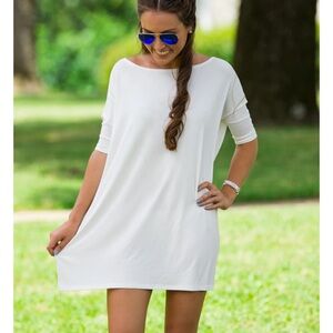 Women’s white, half sleeve, PIKO top. Size S.